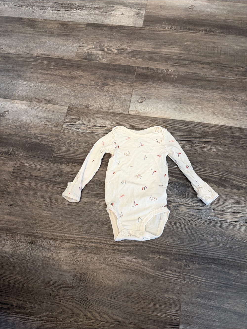 Purely Soft Baby Long-Sleeve Cream Onesie with Subtle Print